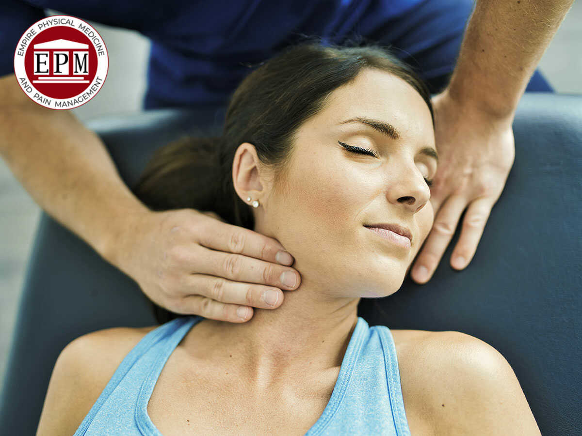 Woman Receiving a Professional Physiotherapy Treatment For Neck Pain Relief In Manhattan, NY